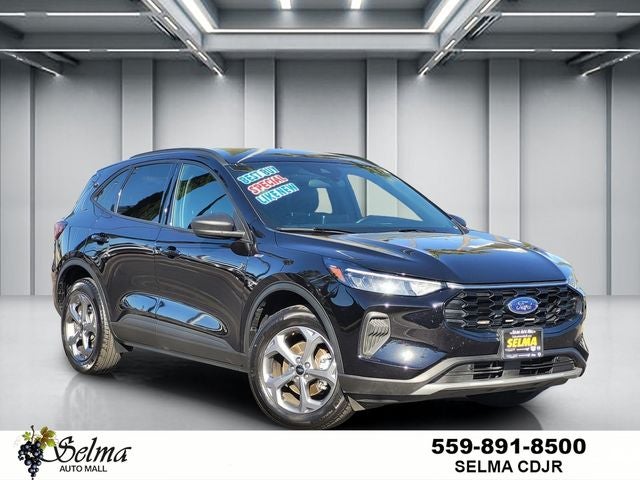 2025 Ford Escape ST-Line in Black Metallic — front three-quarter view
