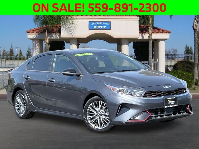 2022 Kia Forte GT-Line in Gravity Gray — front three-quarter view