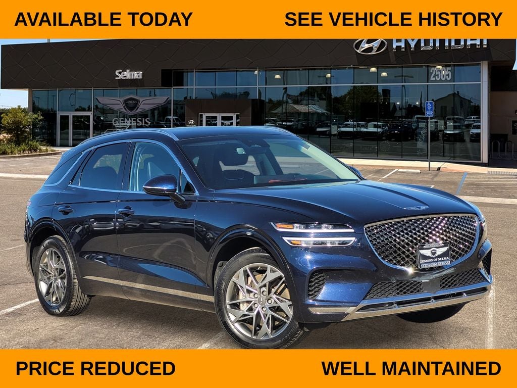 2023 Genesis GV70 2.5T in Capri Blue — front three-quarter view