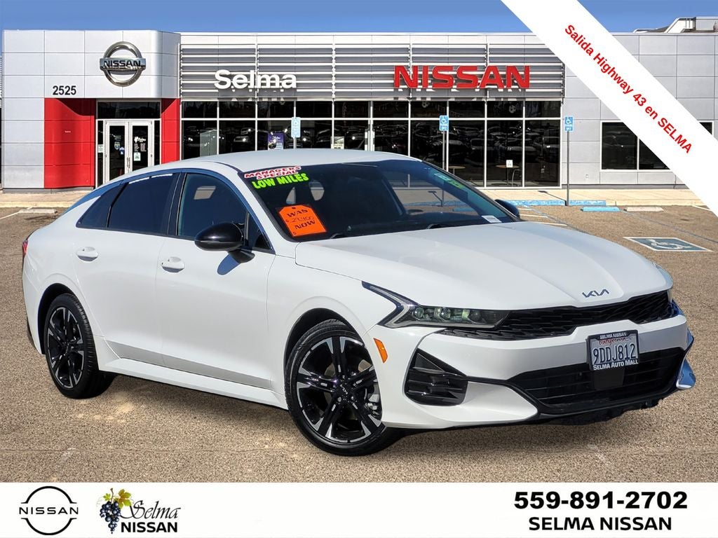 2023 Kia K5 GT-Line in White Pearl — front three-quarter view